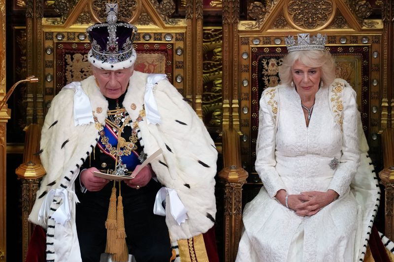 Britain's King Charles III speaks as he sits besides Queen Camilla during the State Opening of Parliament at the Palace of Westminster in London, Wednesday, May 13, 2026.    Kirsty Wigglesworth/Pool via REUTERS