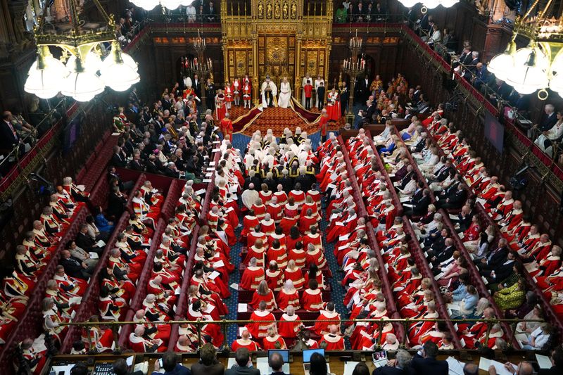 Britain's King Charles III sits besides Queen Camilla during the State Opening of Parliament at the Palace of Westminster in London, Wednesday, May 13, 2026.    Kirsty Wigglesworth/Pool via REUTERS