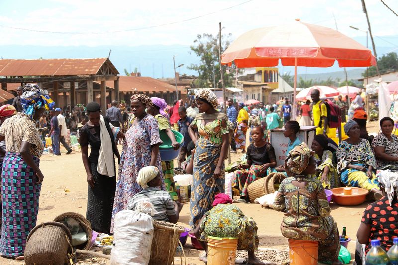 Civilians at a market as members of the Armed Forces of the Democratic Republic of the Congo (FARDC) retook control of multiple localities in the Ruzizi Plains, following the withdrawal of M23 rebels from Uvira territory, in Sange, South Kivu province of the Democratic Republic of Congo, May 12, 2026. REUTERS/Victoire Mukenge