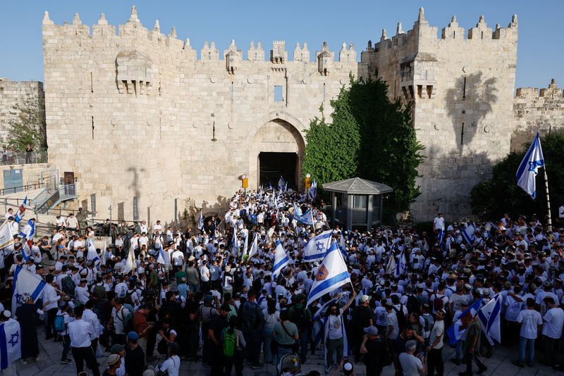 Israelis participate in the annual Jerusalem Day march in Jerusalem, May 14, 2026. REUTERS/Amir Cohen