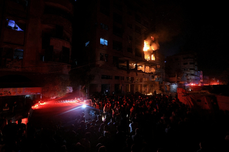 A fire burns in a residential apartment after Israeli shelling, according to the Ministry of Health, in Gaza City May 15, 2026. REUTERS/Dawoud Abu Alkas