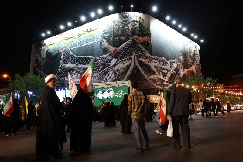 A billboard with a graphic design about the Strait of Hormuz on a building in Tehran, Iran, May 6, 2026. Majid Asgaripour/WANA (West Asia News Agency) via REUTERS