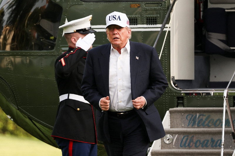 U.S. President Donald Trump returns to the White House after his trip to China, in Washington, D.C., U.S., May 15, 2026. REUTERS/Kevin Lamarque