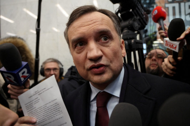 FILE PHOTO: Member of the Law and Justice (PiS) party and former Poland's Justice Minister Zbigniew Ziobro reacts after he was detained by police at the Polish TV Republika station's headquarters to be brought to testify before the Pegasus Investigation Committee, in Warsaw, Poland January 31, 2025. Agencja Wyborcza.pl/Robert Kowalewski/via REUTERS/File Photo
