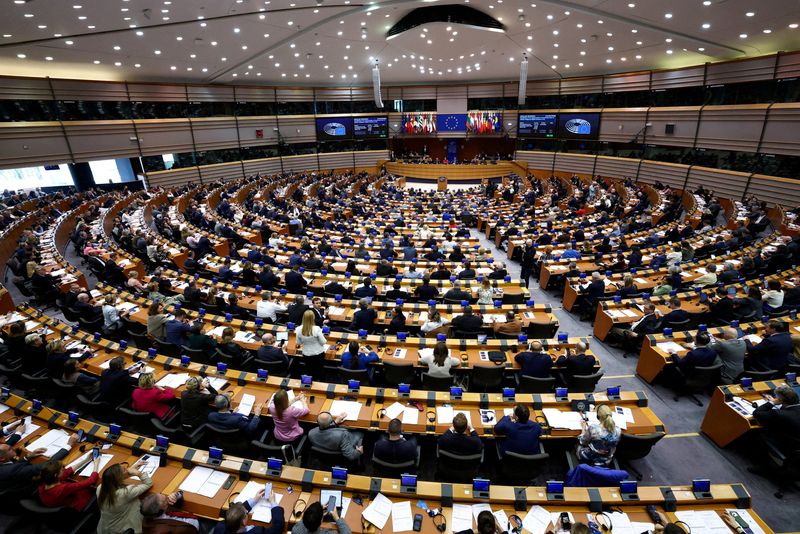 FILE PHOTO: Members of the European Parliament attend a session to vote on legislation to cut import duties for U.S. products, in Brussels, Belgium March 26, 2026. REUTERS/Yves Herman/File Photo