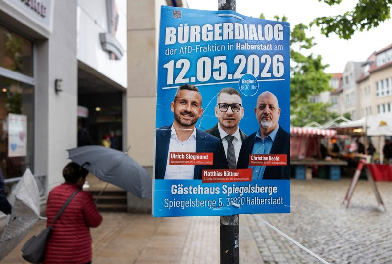 A placard advertises for a citizen dialogue with Ulrich Siegmund, top candidate of the far-right Alternative for Germany (AfD) party in Germany's Saxony-Anhalt state election, in Halberstadt, Germany, May 12, 2026. REUTERS/Liesa Johannssen