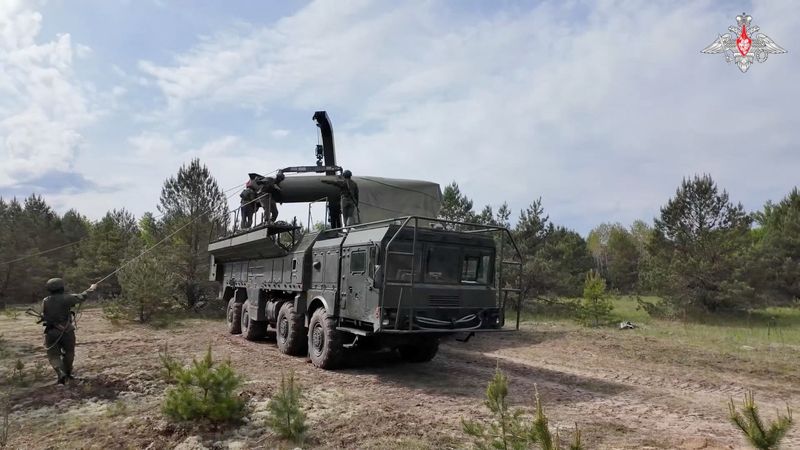 Service members mount a missile on a Russian Iskander-M missile launcher during nuclear forces exercises at an unidentified location in Belarus, in this still image taken from handout footage released on May 21, 2026. Russian Defence Ministry/Handout via REUTERS
