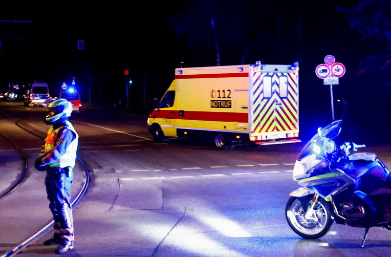 An ambulance believed to be carrying an American health worker, who has been brought to Germany for treatment after contracting Ebola in the Democratic Republic of Congo, arrives at the Charite University Hospital in Berlin, Germany, May 20, 2026.    REUTERS/Axel Schmidt
