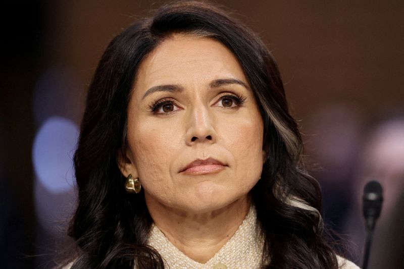 FILE PHOTO: Director of National Intelligence (DNI) Tulsi Gabbard testifies before a Senate Intelligence Committee hearing on Capitol Hill in Washington, D.C., U.S., March 18, 2026.  REUTERS/Kevin Lamarque/File Photo