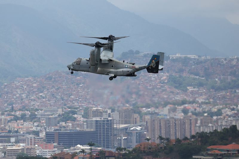 A U.S. Marine Corps MV-22B Osprey aircraft approaches the U.S. embassy during a military exercise, in Caracas, Venezuela, May 23, 2026. REUTERS/Leonardo Fernandez Viloria