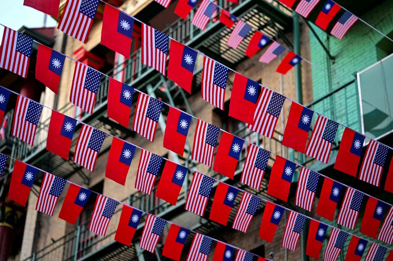 FILE PHOTO: U.S. and Taiwanese flags are seen in San Francisco, California, January 28, 2026. REUTERS/Stephen Nellis/File Photo/File Photo