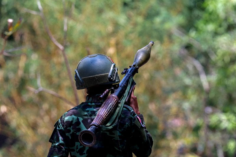 FILE PHOTO: A soldier from the Karen National Liberation Army (KNLA) carries an RPG launcher at a Myanmar military base at Thingyan Nyi Naung village on the outskirts of Myawaddy, the Thailand-Myanmar border town under the control of a coalition of rebel forces led by the Karen National Union, in Myanmar, April 15, 2024. REUTERS/Athit Perawongmetha/File Photo