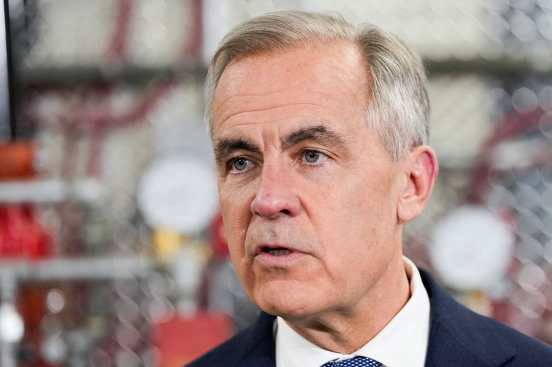 Canada's Prime Minister Mark Carney speaks as he meets unionized skilled trades workers at the United Association of Journeymen and Apprentices of the Plumbing and Pipefitting Industry of the United States and Canada (UA) office in Calgary, Alberta, Canada, May 15, 2026.  REUTERS/Todd Korol