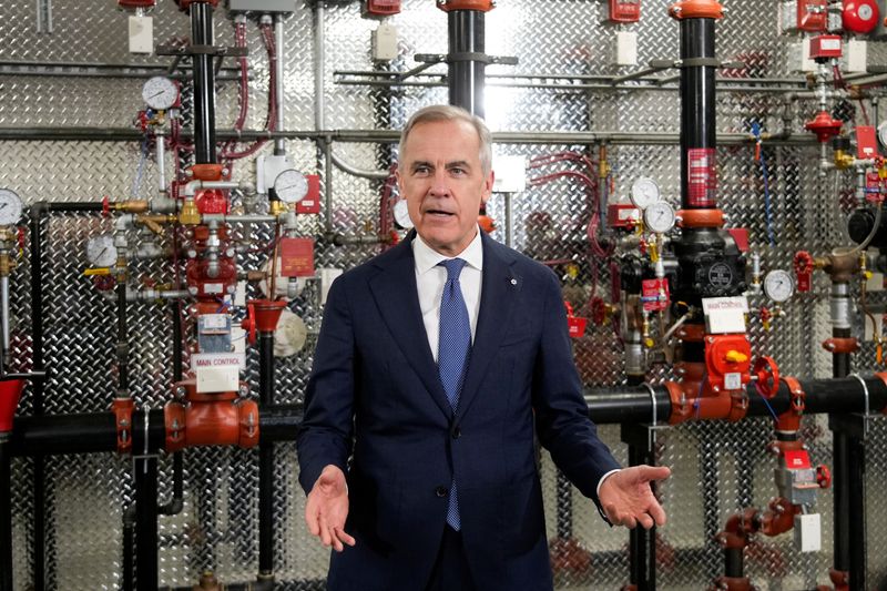 Canada's Prime Minister Mark Carney speaks at the United Association of Journeymen and Apprentices of the Plumbing and Pipefitting Industry of the United States and Canada (UA) office in Calgary, Alberta, Canada, May 15, 2026.  REUTERS/Todd Korol