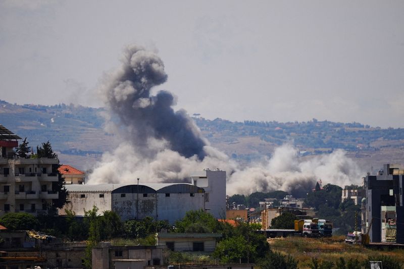 Smoke billows from southern Lebanon following Israeli strikes, as seen from Nabatieh, Lebanon May 28, 2026. REUTERS/Stringer