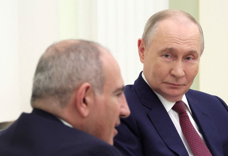 FILE PHOTO: Russian President Vladimir Putin and Armenian Prime Minister Nikol Pashinyan attend a meeting at the Kremlin in Moscow, Russia, April 1, 2026. Sputnik/Mikhail Metzel/Pool via REUTERS/File Photo