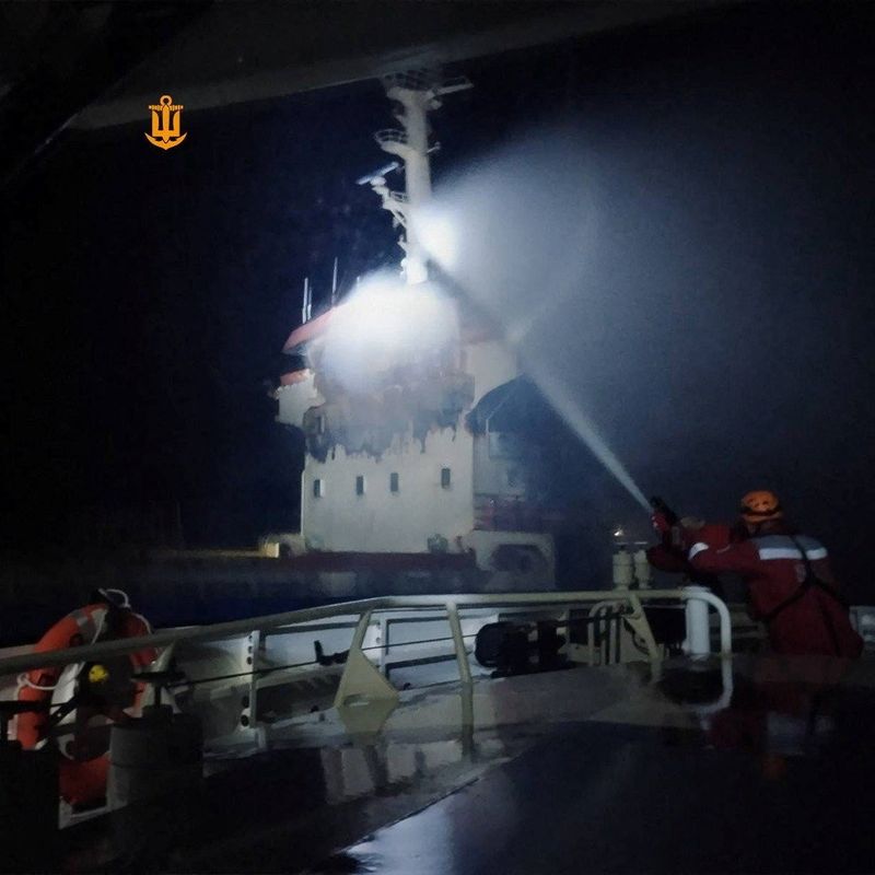 A firefighter works after a Russian drone attacked a Turkey-owned cargo ship Ant sailing under the Vanuatu flag, according to the Ukrainian navy, at the sea, in this handout image released on May 29, 2026. Ukrainian Navy/Handout via REUTERS