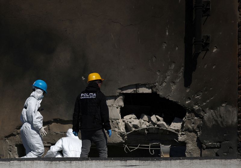 Romanian law enforcement officers work on the site of an explosion at a residential block of flats following a drone hit close to the border with Ukraine, in Galati, Romania, May 29, 2026. Inquam Photos/George Calin via REUTERS
