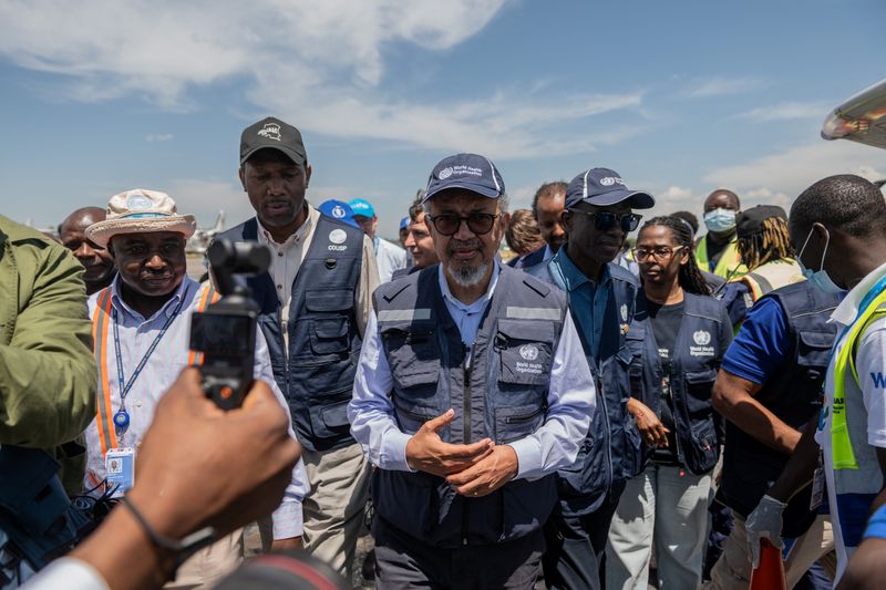 Director-General of the World Health Organisation (WHO) Tedros Adhanom Ghebreyesus is received as he arrives at Bunia National Airport, to coordinate the response to the Ebola outbreak, as agencies intensify efforts to contain a new Ebola outbreak caused by the Bundibugyo virus strain, at the Bunia National Airport in Bunia, Ituri province, Democratic Republic of Congo, May 30, 2026. REUTERS/Stringer