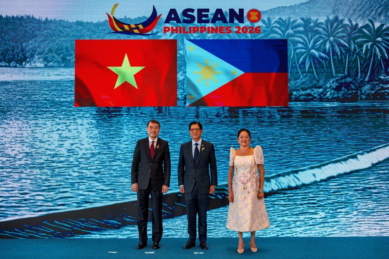 Vietnam's Prime Minister Le Minh Hung poses for a photo with Philippine President Ferdinand Marcos Jr. and his wife Liza Araneta Marcos during the welcome ceremony of the 48th ASEAN Summit and Related Meetings in Cebu, Philippines, May 8, 2026. Ezra Acayan/Pool via REUTERS