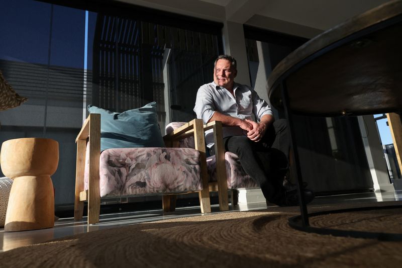 SJ du Venage, a provincial councilman for Freedom Front Plus, a right-wing, white Afrikaner political party, at his residence in Saint Helena Bay, Western Cape, South Africa, May 20, 2026. Du Venage has applied for the U.S. refugee programme. REUTERS/Esa Alexander