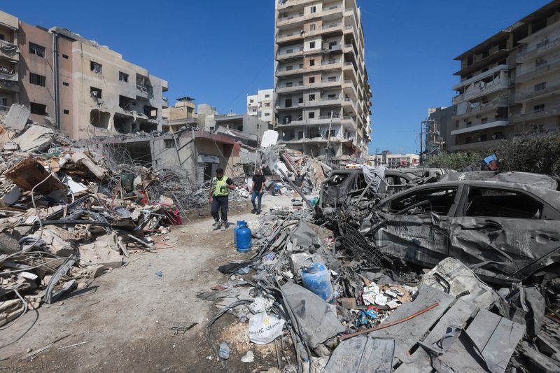 People inspect the damage in the aftermath of an Israeli strike that hit near a hospital on Monday, in Tyre, Lebanon, June 2, 2026. REUTERS/Aziz Taher