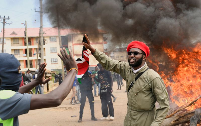 FILE PHOTO: Demonstrators participate during a protest against a U.S.-backed Ebola quarantine plan on the establishment of a 50-bed facility at a Kenyan air force base that was intended to host Americans exposed to Ebola, in Nanyuki town, in Laikipia County, Kenya June 1, 2026. REUTERS/John Muchucha/File Photo