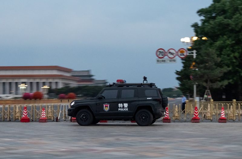 A police car is parked in the Tiananmen Square in Beijing, China, June 3, 2026. REUTERS/Maxim Shemetov