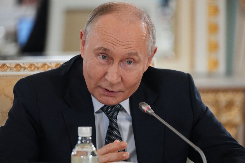 Russian President Vladimir Putin speaks to representatives of international news agencies on the sidelines of the St. Petersburg International Economic Forum, at the Constantine Palace in St. Petersburg, Russia, June 4, 2026.      Dmitri Lovetsky/Pool via REUTERS
