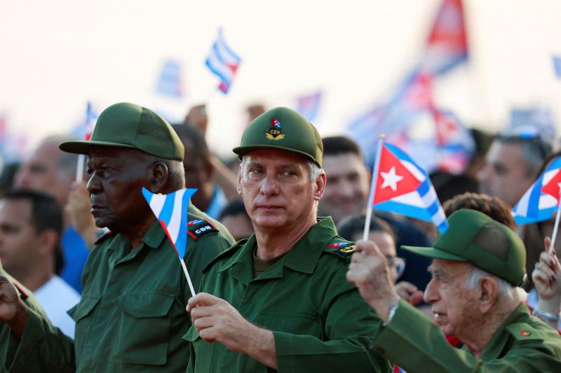 Cuba's President Miguel Diaz-Canel attends a government rally called by Cuban authorities to protest U.S. policies toward the island, including the indictment of the former president, in Havana, Cuba, May 22, 2026. REUTERS/Norlys Perez