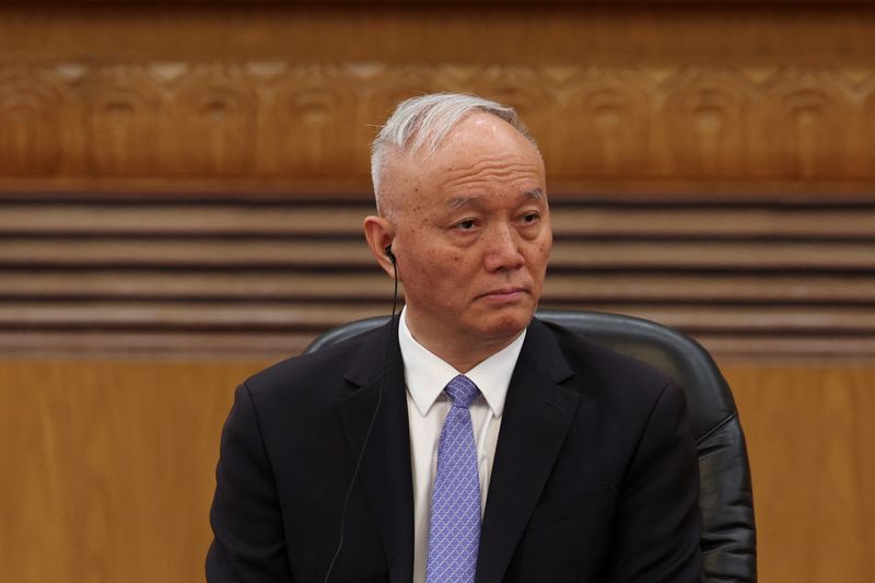 Chinese Politburo Standing Committee member Cai Qi attends a meeting with global business leaders at the Great Hall of the People in Beijing, China, March 28, 2025. REUTERS/Florence Lo