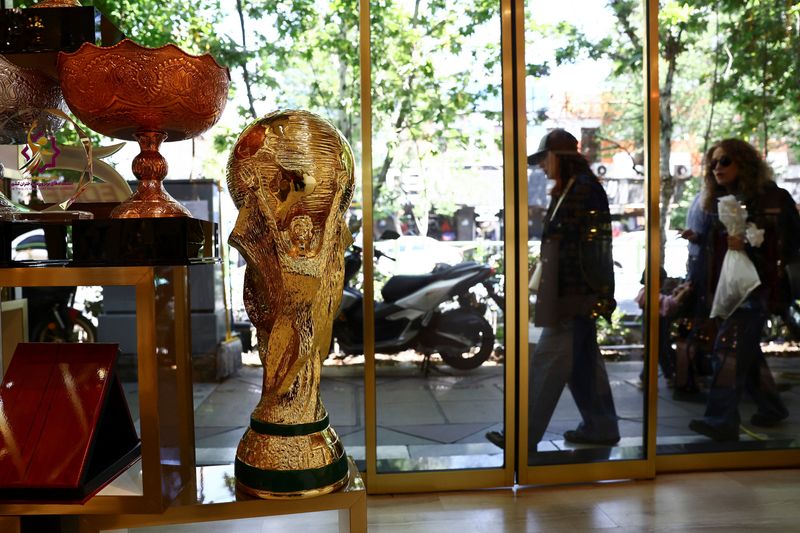 A replica of the FIFA World Cup trophy is displayed in a shop, in Tehran, Iran, April 23, 2026. Majid Asgaripour/WANA (West Asia News Agency) via REUTERS