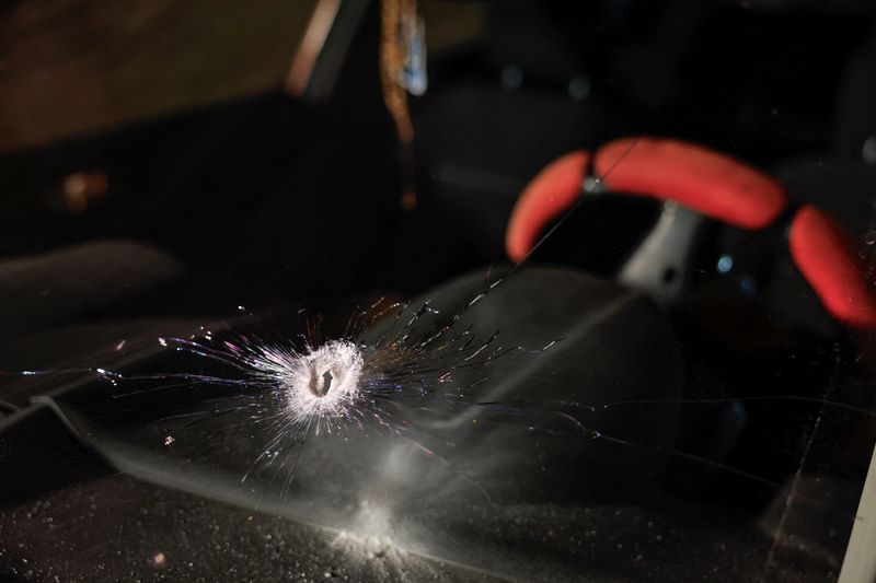 A bullet hole in the front window of a car of Palestinian father Fahed Abu Haykal after his seven-month-old baby was killed by Israeli forces, in Hebron in the Israeli-occupied West Bank, June 5, 2026. REUTERS/Mussa Qawasma