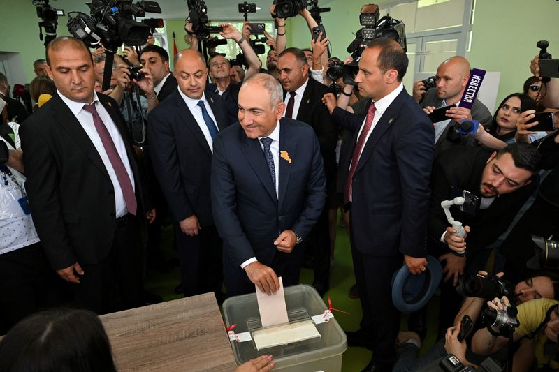 Armenian Prime Minister and leader of the Civil Contract party Nikol Pashinyan casts a ballot at a polling station during a parliamentary election in Yerevan, Armenia, June 7, 2026. Stringer/Photolure via REUTERS