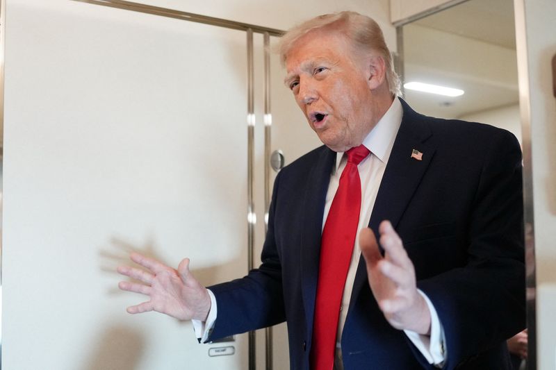 U.S. President Donald Trump speaks to members of the media on board Air Force One while flying from Joint Base Andrews to Chippewa Valley Regional Airport in Eau Claire, Wisconsin, U.S., June, 5, 2026. REUTERS/Nathan Howard