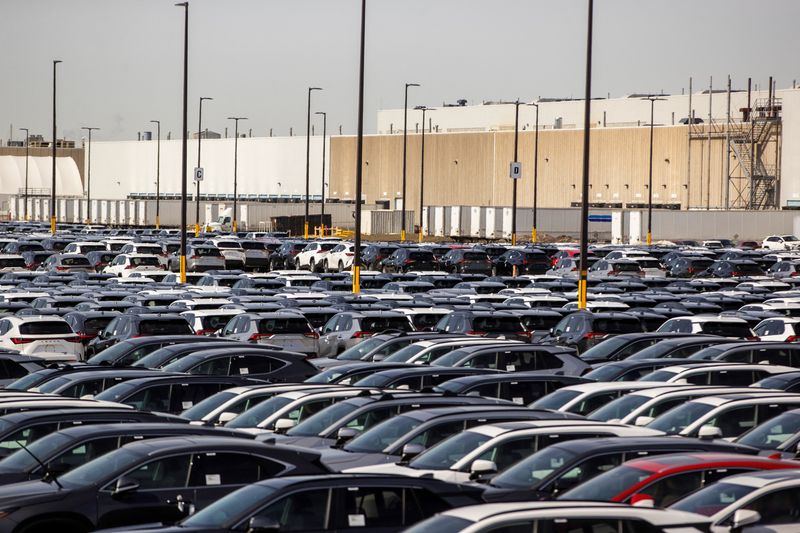 Vehicles are parked in lots at the Toyota Motor Manufacturing plant in Cambridge, Ontario, Canada, March 13, 2025. REUTERS/Carlos Osorio