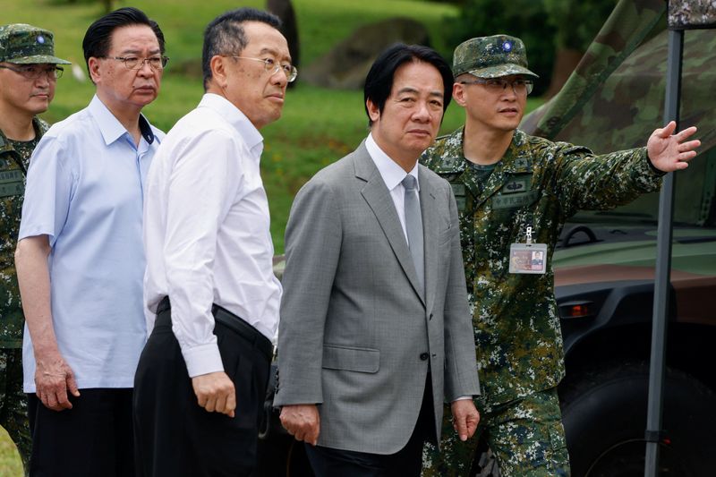 Taiwan President Lai Ching-te reacts as a military officer gestures during a briefing at the Guandu Area Command in New Taipei City, Taiwan, June 16, 2026. REUTERS/Ann Wang