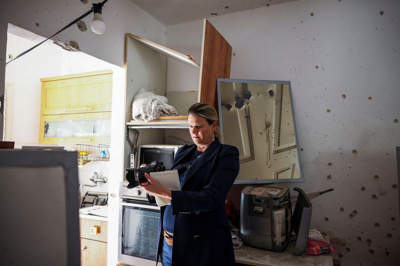 FILE PHOTO: Dr Alice Jill Edwards, the UN Special Rapporteur on Torture, visits Kibbutz Kfar Aza, one of the Israeli communities ravaged during the deadly October 7, 2023 attack by Hamas, in Kibbutz Kfar Aza, in southern Israel, December 18, 2024. REUTERS/Stoyan Nenov/File Photo