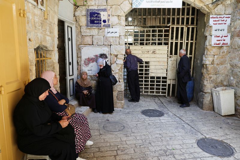 Palestinians wait to enter the Ibrahimi Mosque, also known as the Cave of Patriarchs, in the old city of Hebron, in the Israeli-occupied West Bank, June 17, 2026. REUTERS/Ammar Awad