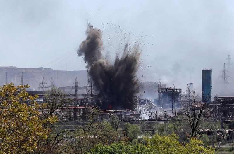 FILE PHOTO: A view shows an explosion at a plant of Azovstal Iron and Steel Works during Ukraine-Russia conflict in the southern port city of Mariupol, Ukraine May 11, 2022. REUTERS/Alexander Ermochenko/File Photo
