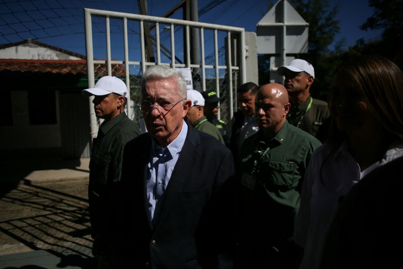 Colombia's former President Alvaro Uribe Velez visits a polling station to vote, during the first round of the presidential election, in Rio Negro, Colombia, May 31, 2026. REUTERS/Juan David Duque