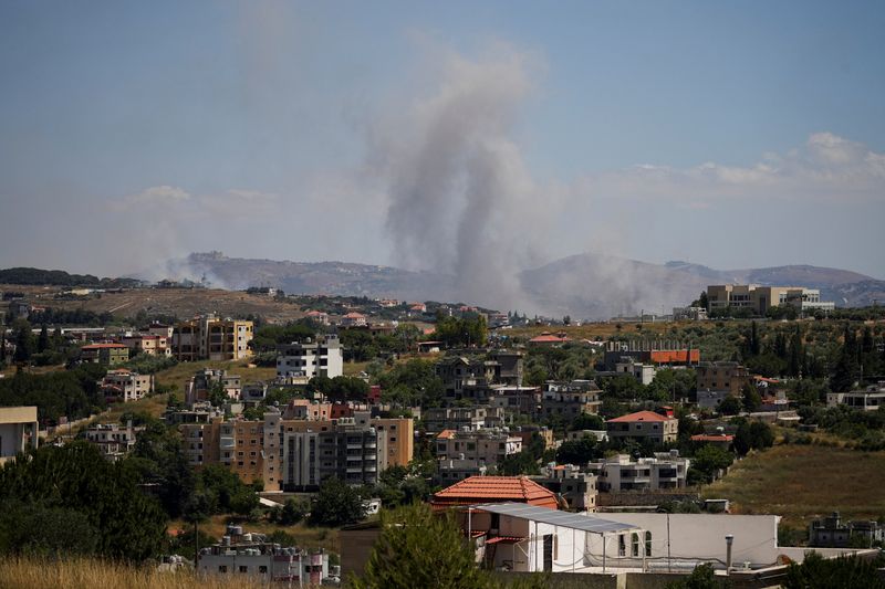 Smoke billows from southern Lebanon following an Israeli strike, as seen from Kfartibnit, Lebanon, June 19, 2026. REUTERS/Stringer