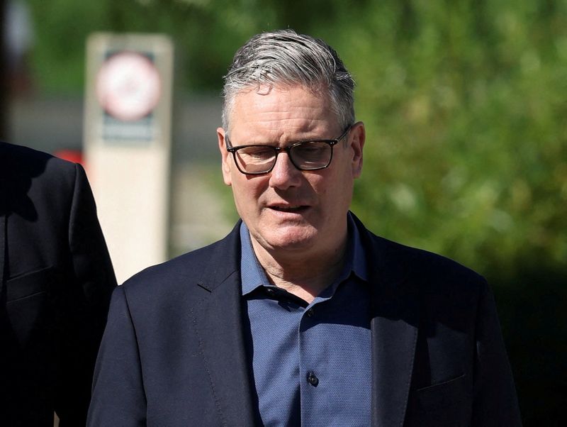 Britain's Prime Minister Keir Starmer walks as he visits a housing development in north London, Britain, June 19, 2026. Peter Macdiarmid/Pool via REUTERS