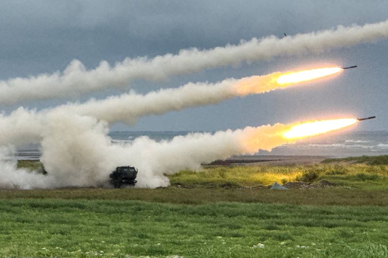 Taiwan's High Mobility Artillery Rocket Systems (HIMARS) fire rockets during a live-fire military exercise, which simulates an enemy invasion, in Taichung, Taiwan June 10, 2026. Picture taken with a mobile phone. REUTERS/Angie Teo