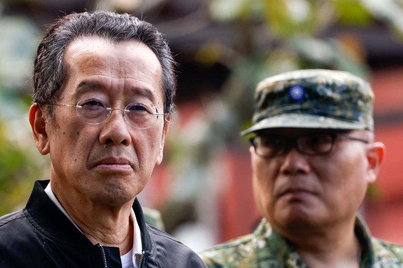 Taiwan Defence Minister Wellington Koo inspects reservists during a training session at Loung Te Industrial Parks Service Center in Yilan, Taiwan December 2, 2025. REUTERS/Ann Wang