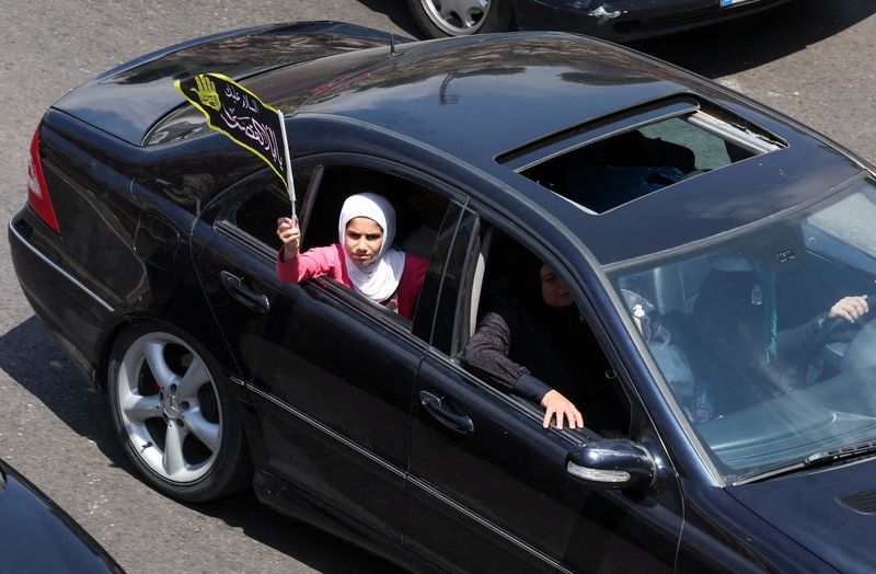 Displaced people make their way back to their homes in southern Lebanon following an interim deal between the U.S. and Iran, in Sidon, Lebanon, June 24, 2026. REUTERS/Aziz Taher