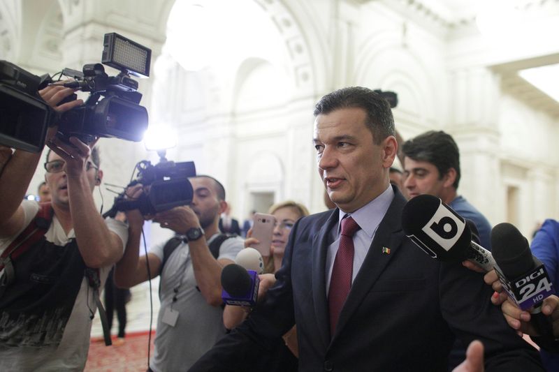 Romanian Prime Minister Sorin Grindeanu walks after a no-confidence motion in Bucharest, Romania, June 21, 2017. Inquam Photos/Octav Ganea via REUTERS