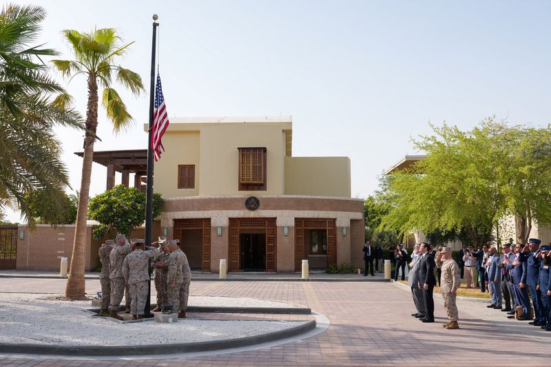 U.S. Secretary of State Marco Rubio and Steven Butler, charge d'affaires ad interim of the U.S. embassy in Kuwait, attend a flag raising ceremony at the U.S. embassy during Rubio's visit to the Middle East to discuss the interim deal between the U.S. and Iran with Arab Gulf allies, in Kuwait City, Kuwait, June 24, 2026. REUTERS/Eric Lee/Pool