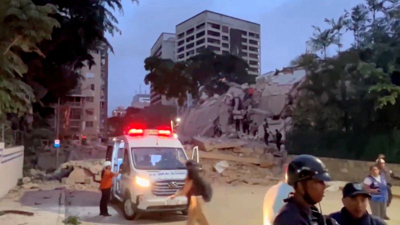 An ambulance at the site of a collapsed building after a strong earthquake shook north-central Venezuela on Wednesday afternoon, in Caracas, Venezuela, June 24, 2026, in this screengrab from video. REUTERS TV/via REUTERS