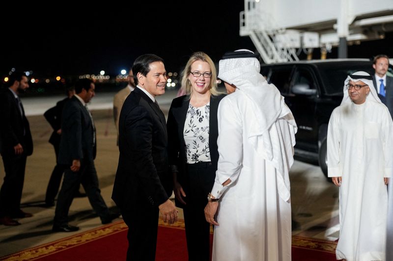 FILE PHOTO: Bahrain's Foreign Minister Abdullatif bin Rashid Al Zayani and U.S. Ambassador to Bahrain Stephanie Hallett greet U.S. Secretary of State Marco Rubio upon arrival at Bahrain International Airport during his visit to the Middle East to discuss the interim deal between the U.S. and Iran with Arab Gulf allies, in Muharraq, near Manama, Bahrain, June 24, 2026. REUTERS/Eric Lee/Pool/File Photo